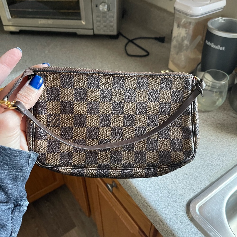 LV poochette, like new, some wear inside and on zipper.